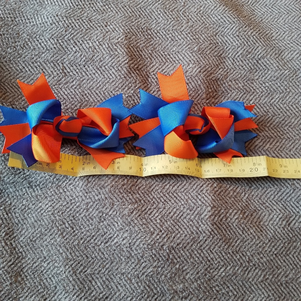 Blue/orange pigtail bows NEW